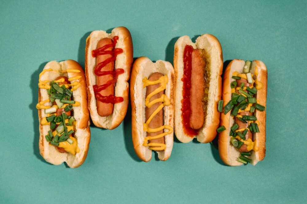 hotdogs on a teal background