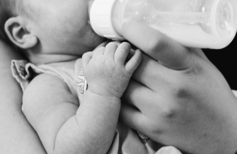 Baby drinking from a bottle