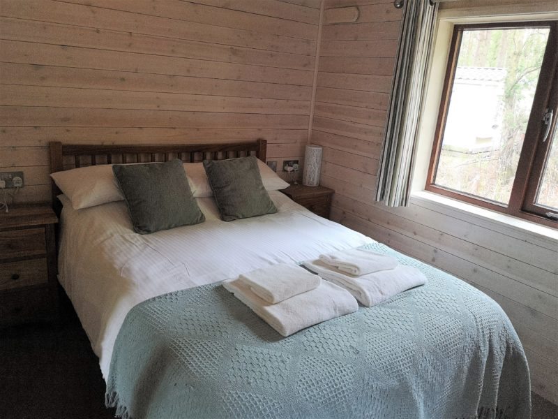 Kelling Heath 2 bedroom woodland lodge master bedroom