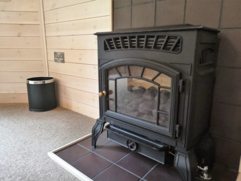 Kelling Heath 2 bedroom woodland lodge fireplace