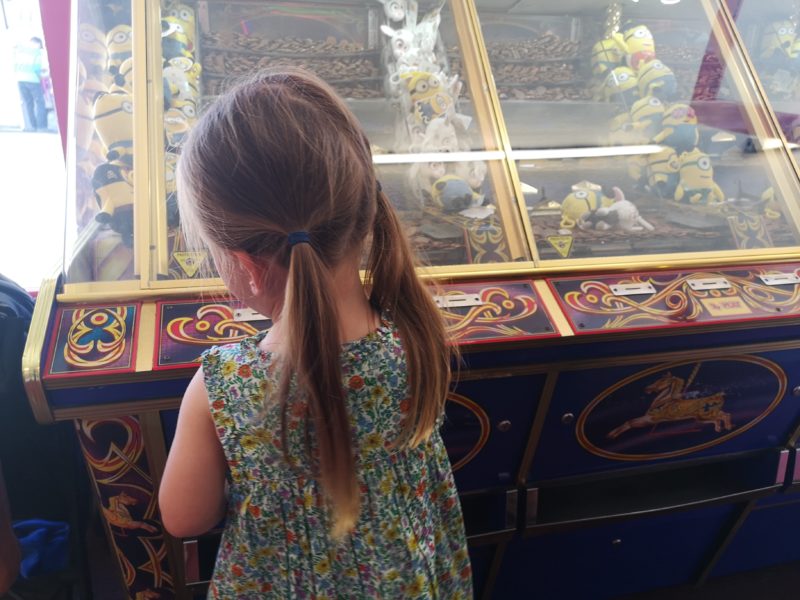 Erin playing at Sheringham arcades