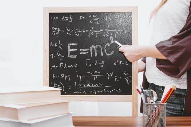 Math board with books and chalk