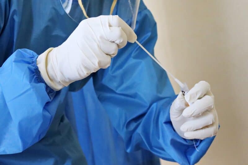 Medical gloves with swab test