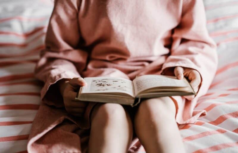Child reading a book