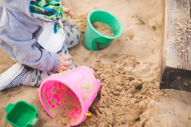 Child playing in sand