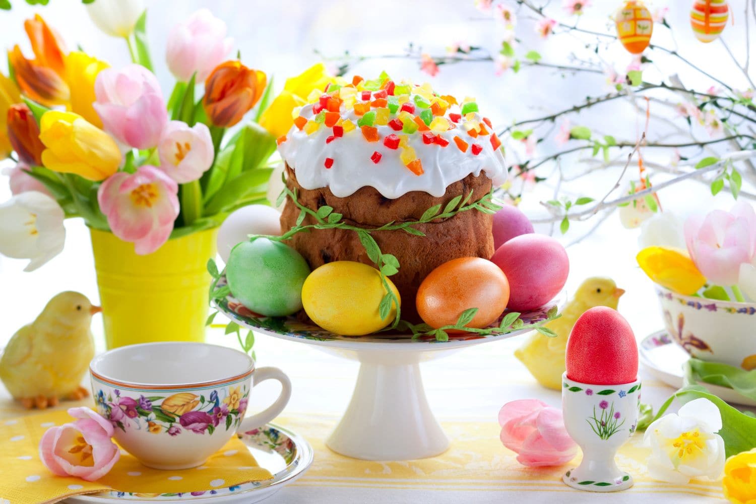 Easter cake and colourful eggs on a table, with Easter theme