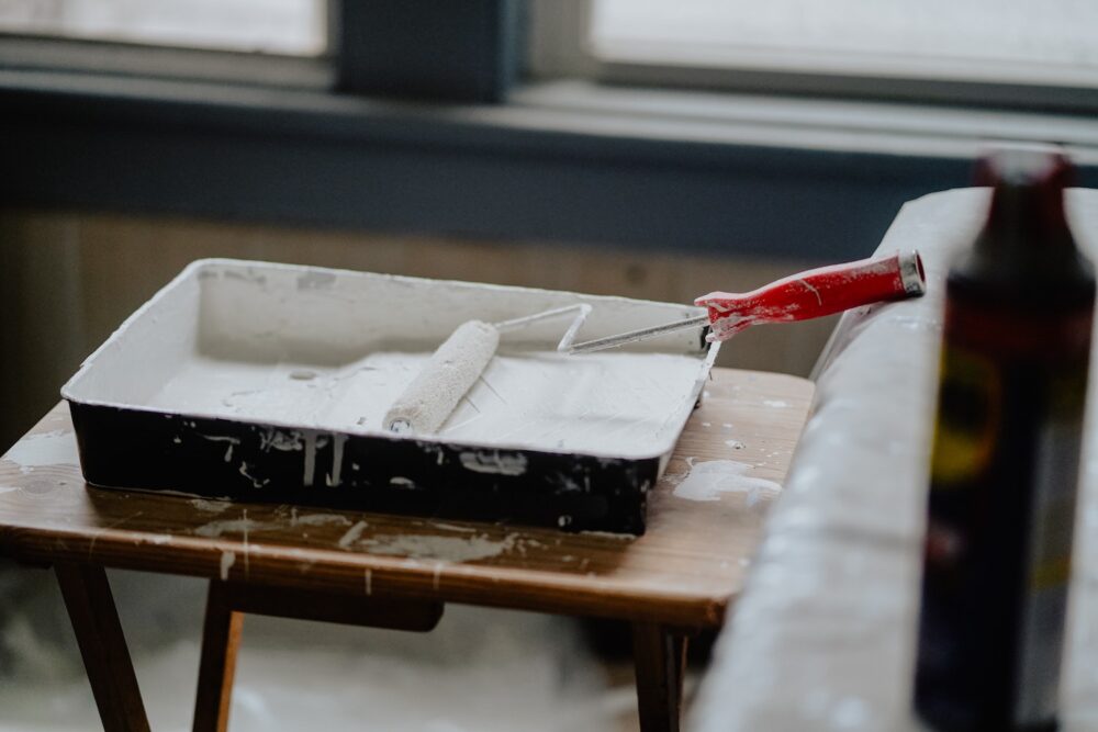 Paint and roller on a table