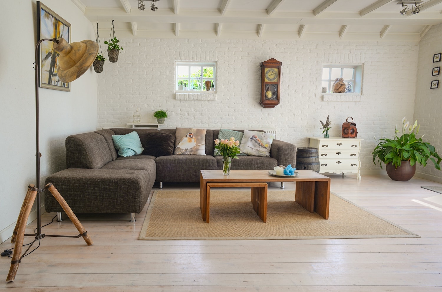 Brown sofa in a living room with wooden table