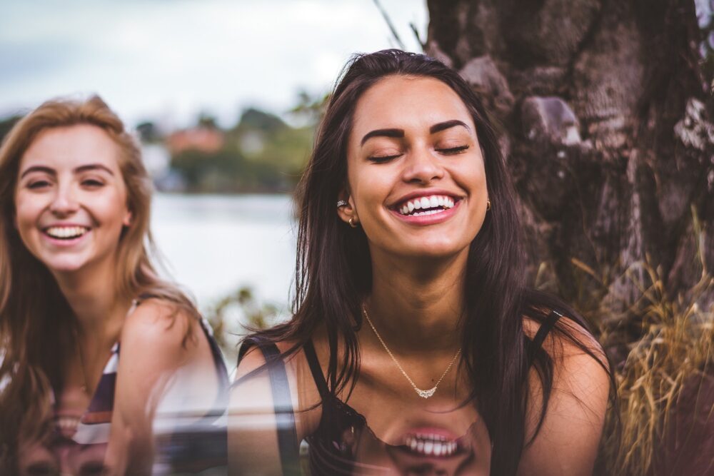 Two women smiling