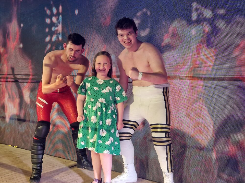 Erin with the stars of Welsh wrestling