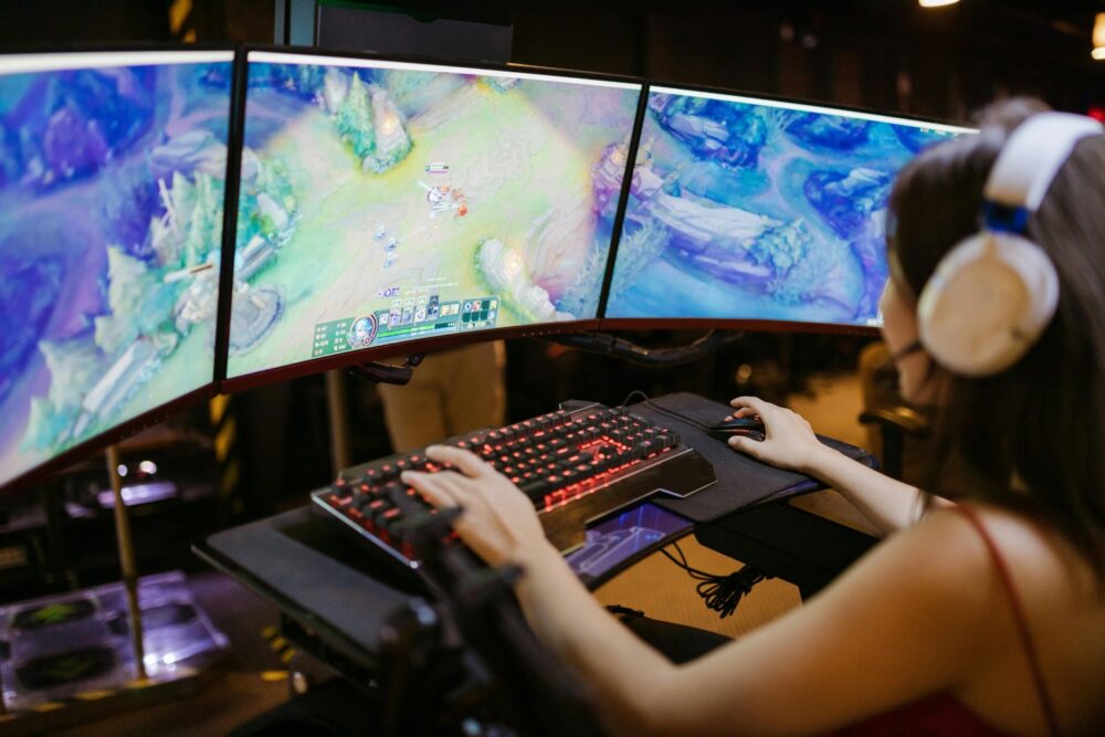 A Woman Playing League of Legends