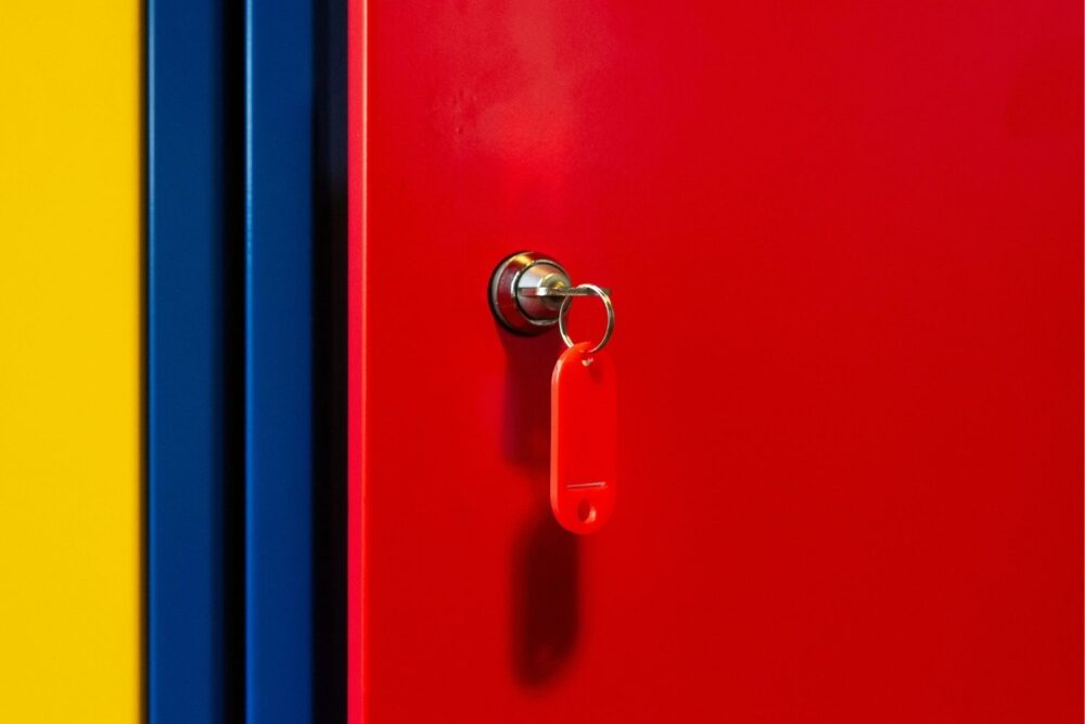 Colourful Locker with Key in Bright Red Door